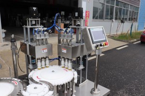 diagnostic reagent tube filling and capping machine